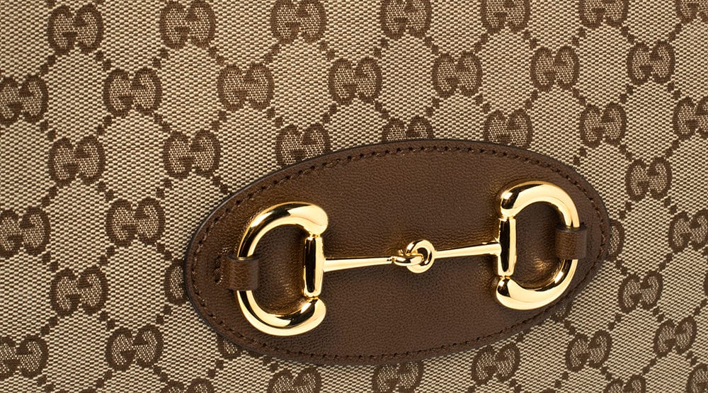 Gucci - The Horsebit encapsulates the House's rich equestrian heritage and  can be found on a number of styles from the Gucci Horsebit 1955 collection.  New styles are crafted in tan leather