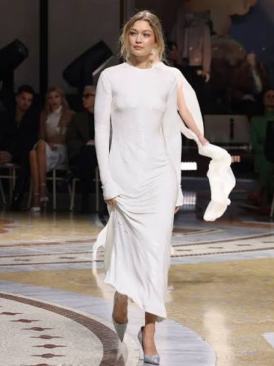 Gigi Hadid in an all-white look later in the evening at Vogue World Milano 2026 on September 22