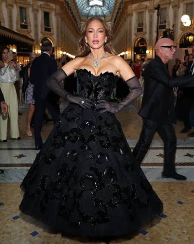Jennifer Lopez in a black tulle Dolce and Gabbana Alta Moda gown at Vogue World