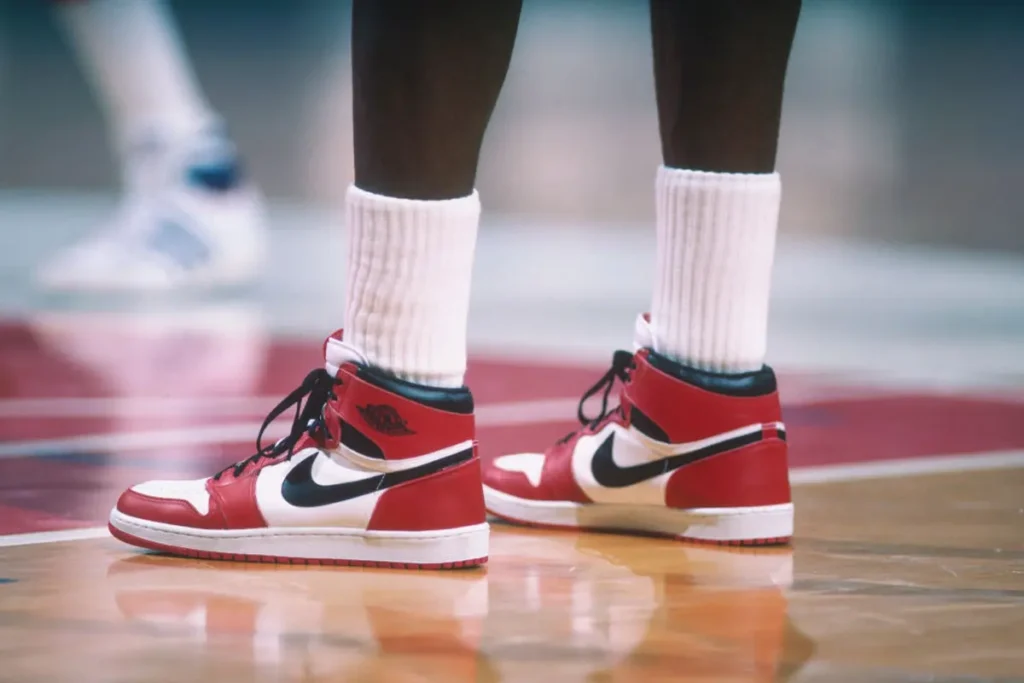 Air Jordan 1 High OG Chicago sneakers, the iconic red, black and white colorway worn by Michael Jordan